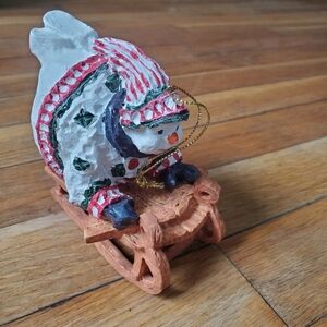 Round large snowman on sled Christmas tree ornament‎